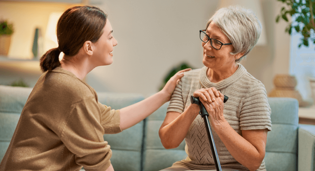Family caregiver taking a break while professional helps - Respite Care support under Home Care Services in Canada